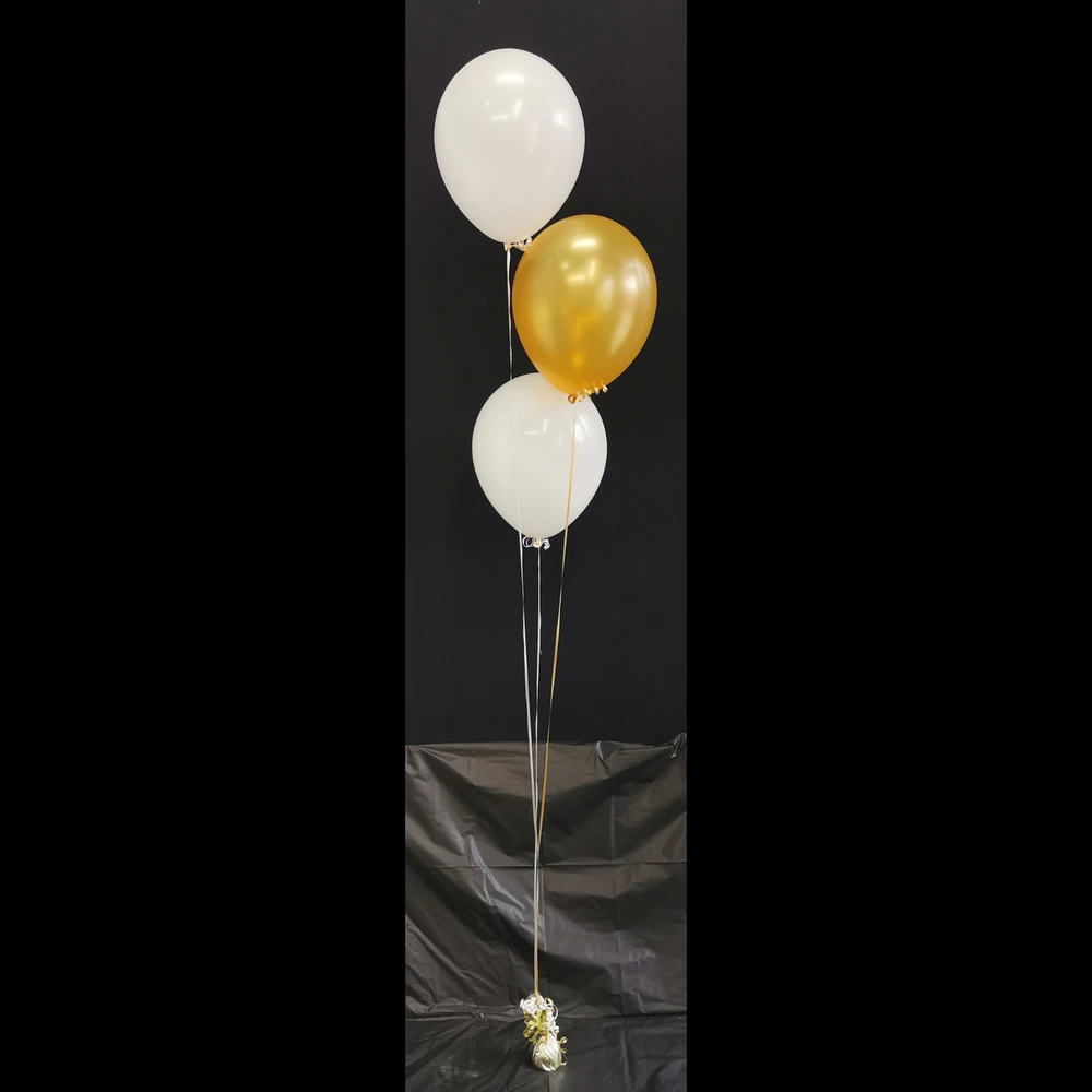 Yellow and white balloon tower